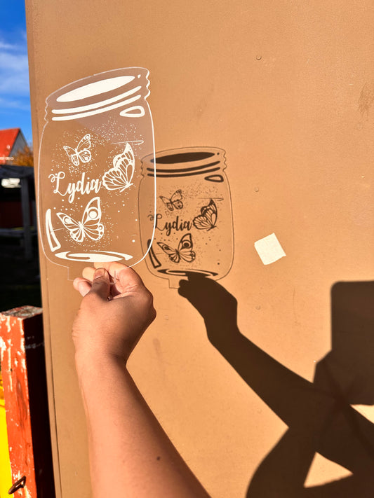 Jar with butterflies and name